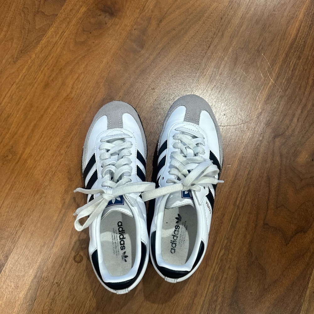 Adidas Samba OG shoes in Cloud White and Core Black with a gum rubber outsole.